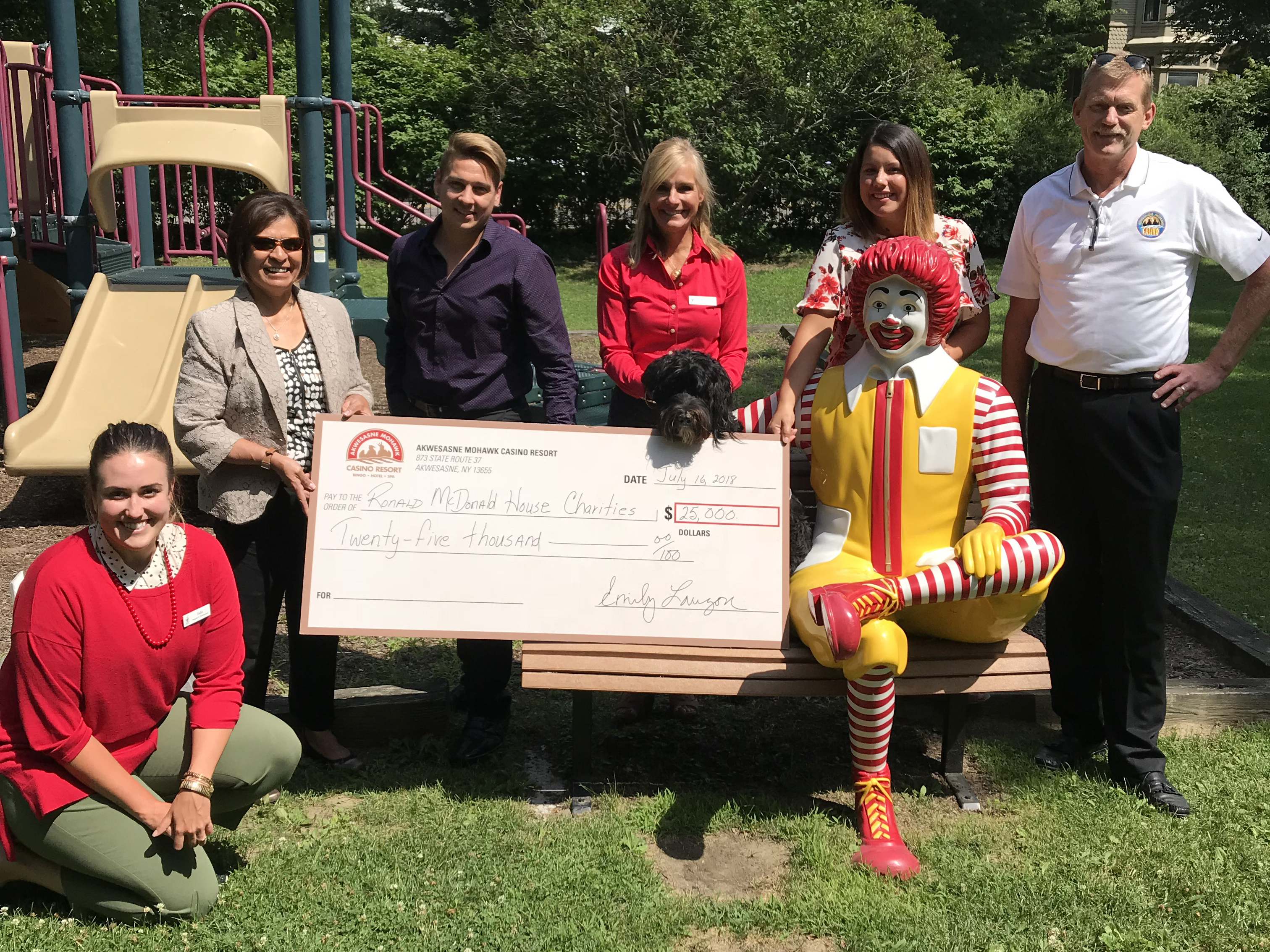 Baji999 Casino Resort deliver checks to recipients of their first annual golf fundraising event